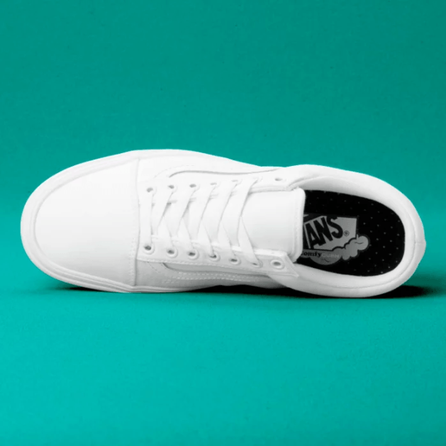 White and teal 2024 vans